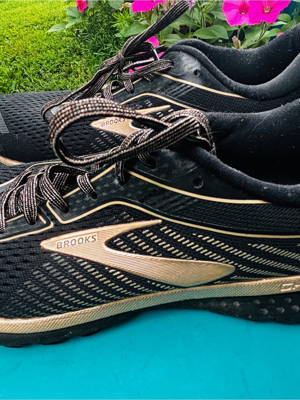 Brooks Women’s Black and Gold Performance Running Sneakers Ghost 12